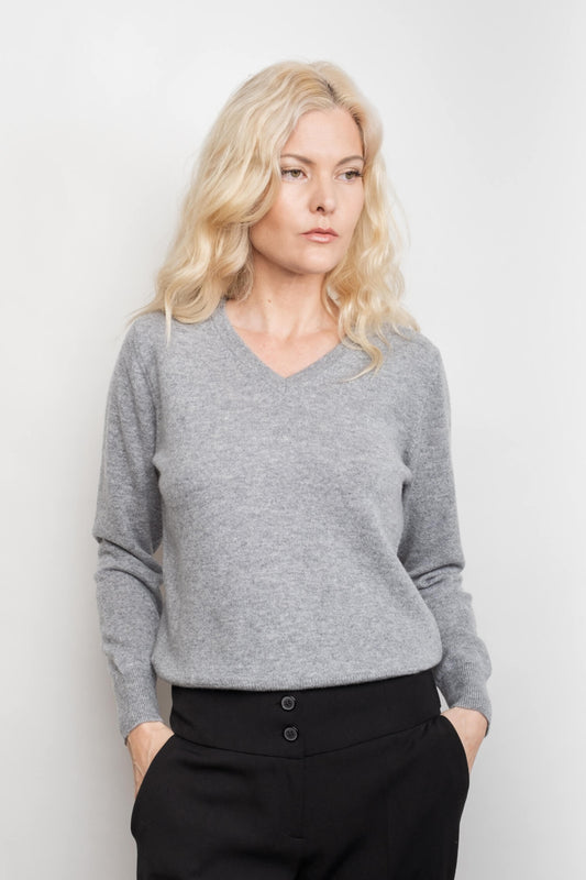 Model in grey rib V-neck cashmere sweater, hands in pockets – Love Cashmere NZ
