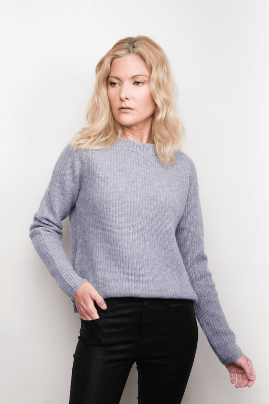 Model wearing grey fisherman cashmere sweater, studio view – Love Cashmere NZ
