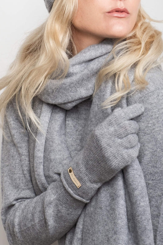 Close-up of model wearing grey cashmere gloves with scarf – Love Cashmere NZ