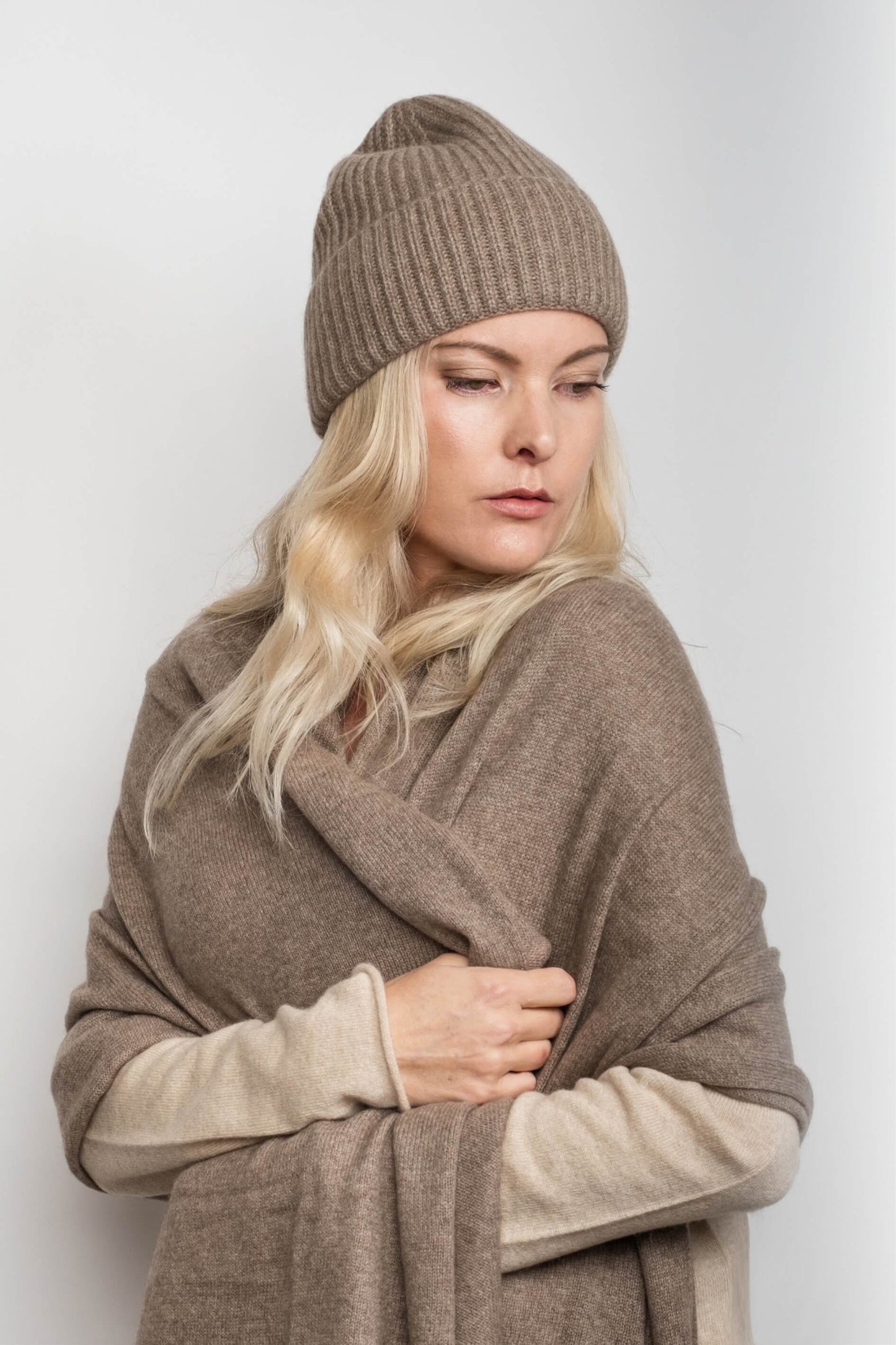 Woman in chestnut beanie wrapped in chestnut cashmere wrap – Love Cashmere NZ
