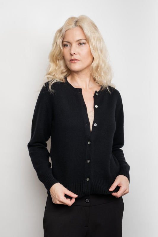 Model in black cashmere golfer cardigan worn open – Love Cashmere NZ