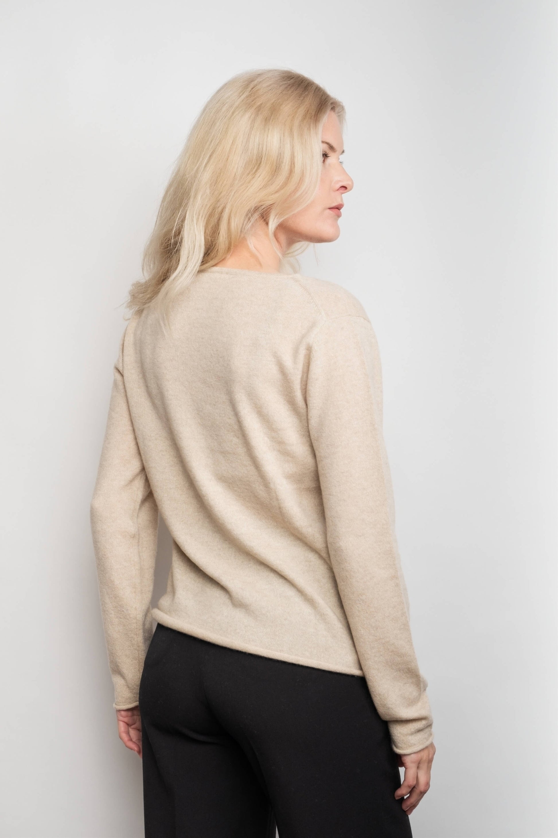Back view of beige relaxed V-neck cashmere sweater – Love Cashmere NZ