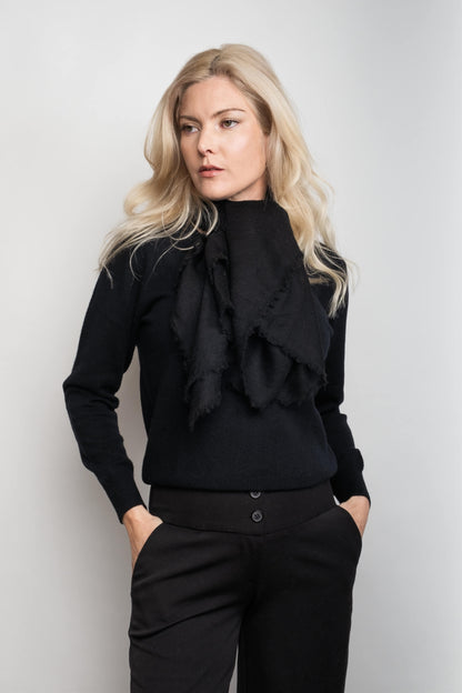 Woman in black cashmere sweater with black ruffled scarf – Love Cashmere NZ