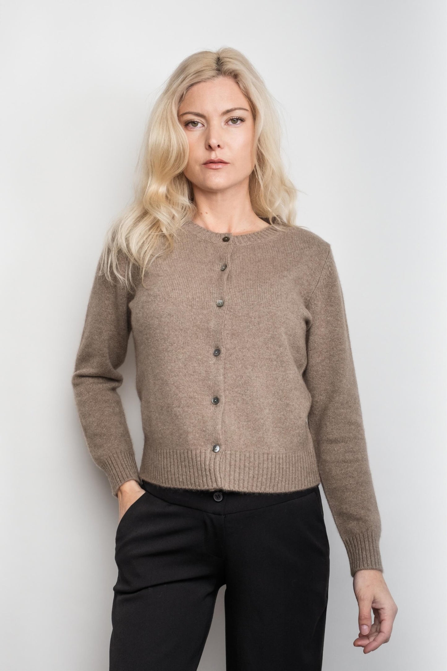 Woman wearing chestnut button-front cashmere golfer cardigan – Love Cashmere NZ