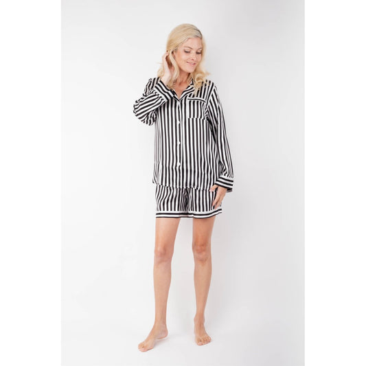 Model in black striped silk pyjama top and shorts set – LS Silk NZ