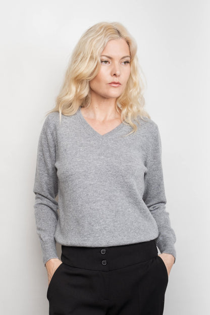 Model in grey rib V-neck cashmere sweater, hands in pockets – Love Cashmere NZ