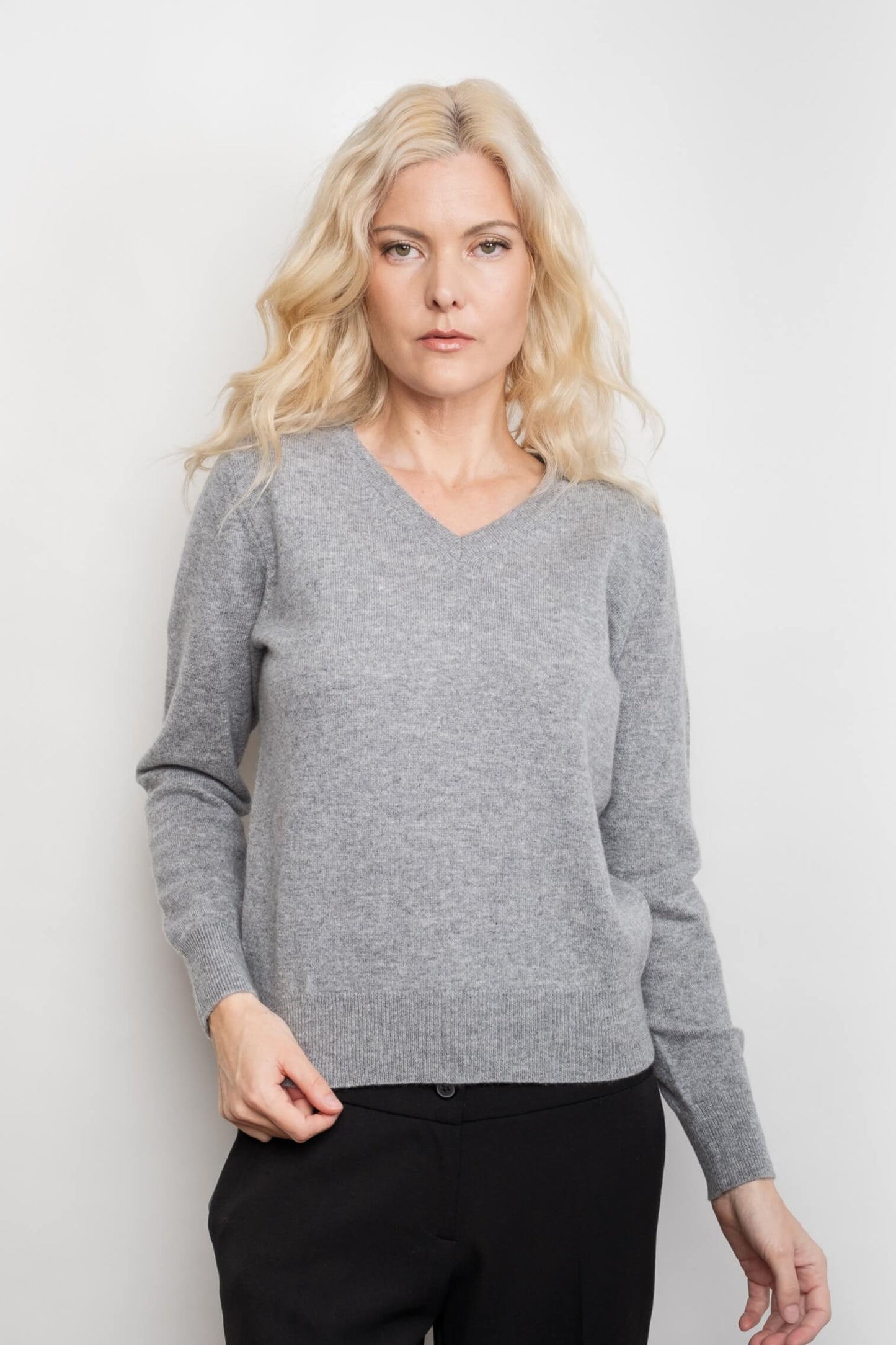Woman wearing grey ribbed V-neck pure cashmere sweater – Love Cashmere NZ