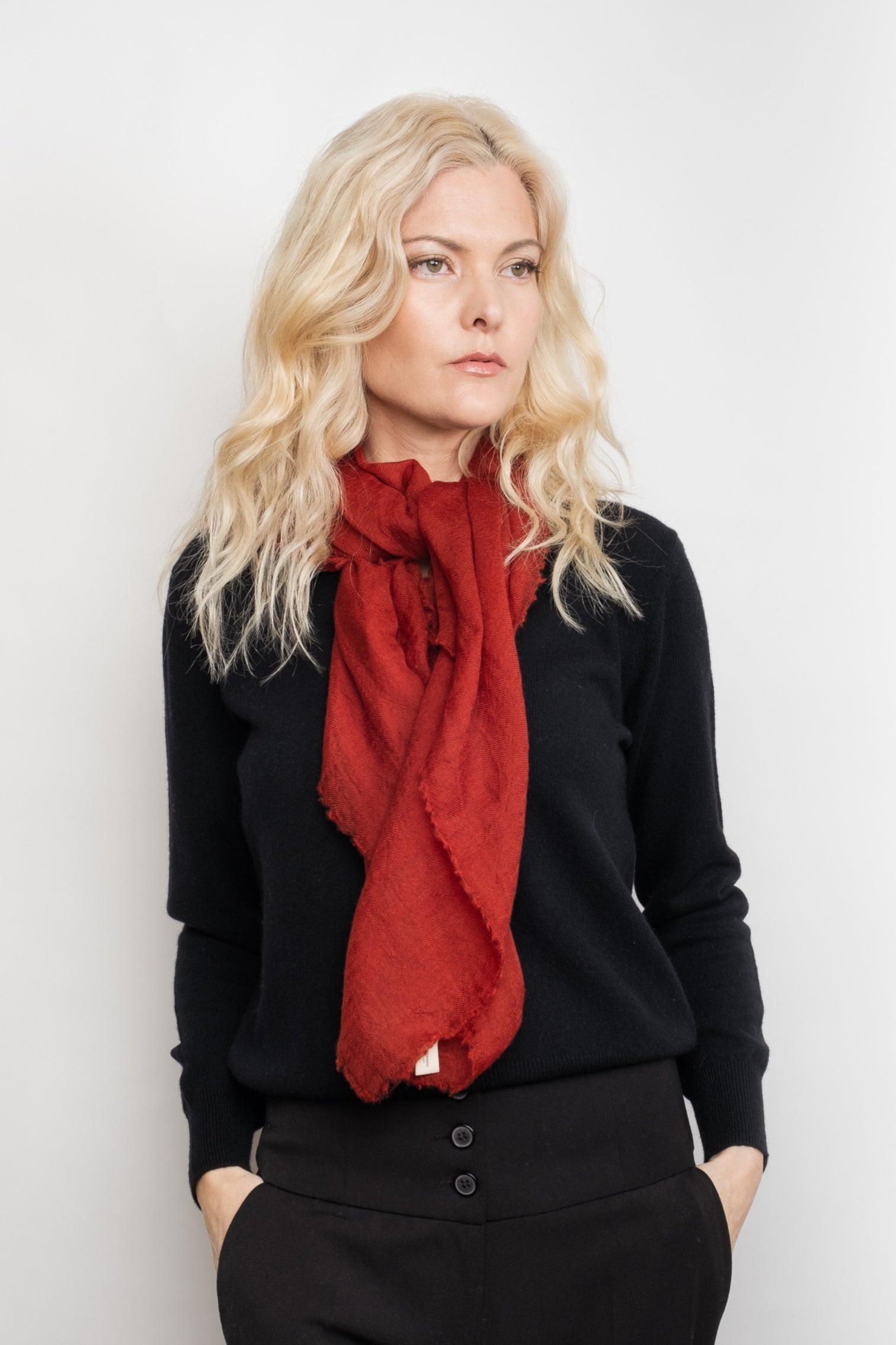 Model in black sweater with sangria red cashmere scarf – Love Cashmere NZ