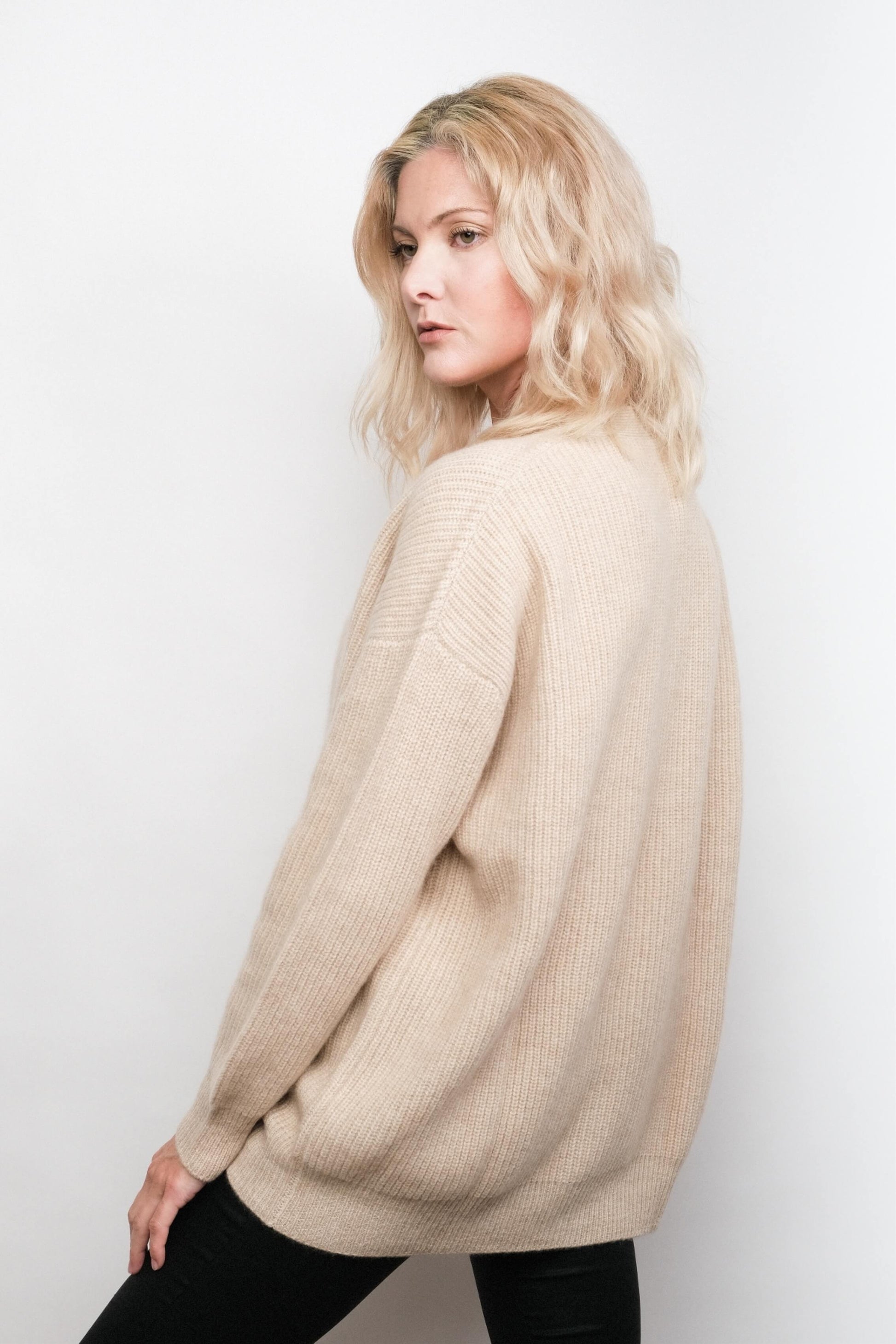 Side view of beige relaxed-fit cashmere cardigan – Love Cashmere NZ