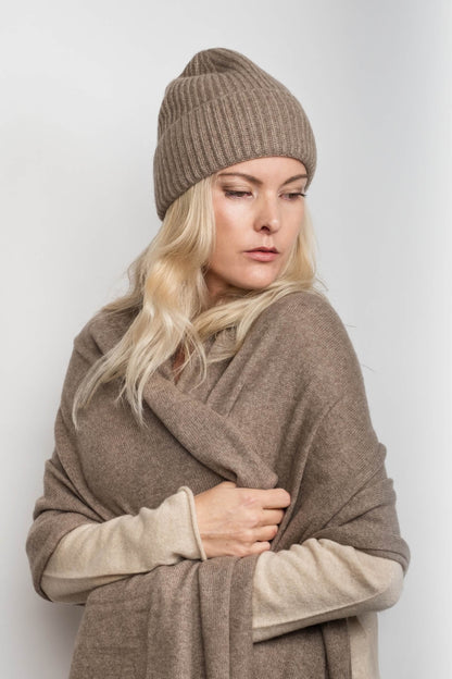 Woman in chestnut beanie wrapped in chestnut cashmere wrap – Love Cashmere NZ