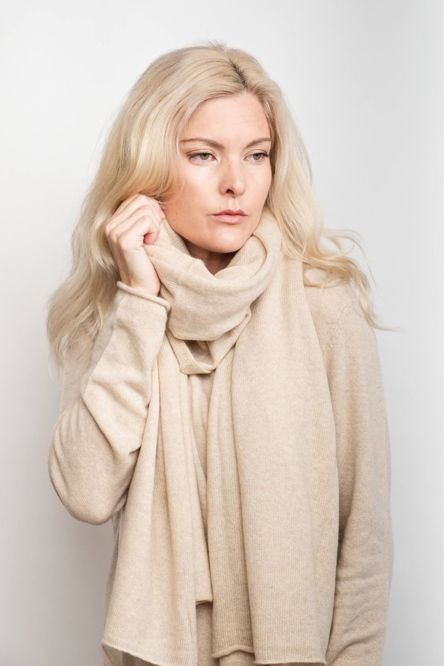 Woman wearing beige pure cashmere wrap as a long scarf – Love Cashmere NZ