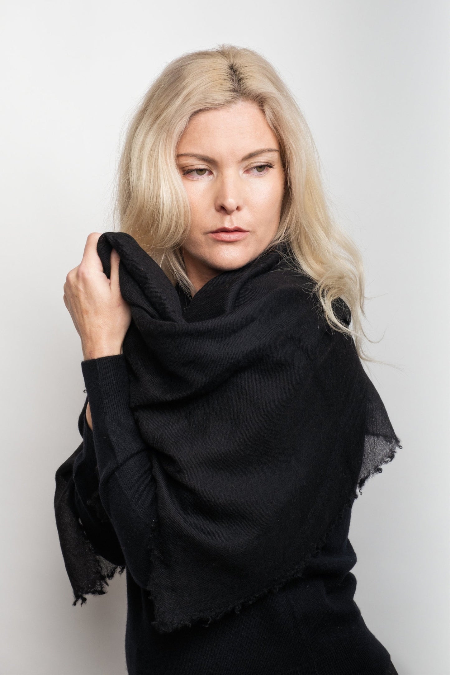 Woman wrapped in black lightweight cashmere scarf – Love Cashmere NZ