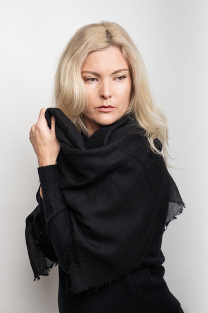 Woman wrapped in black lightweight cashmere scarf – Love Cashmere NZ