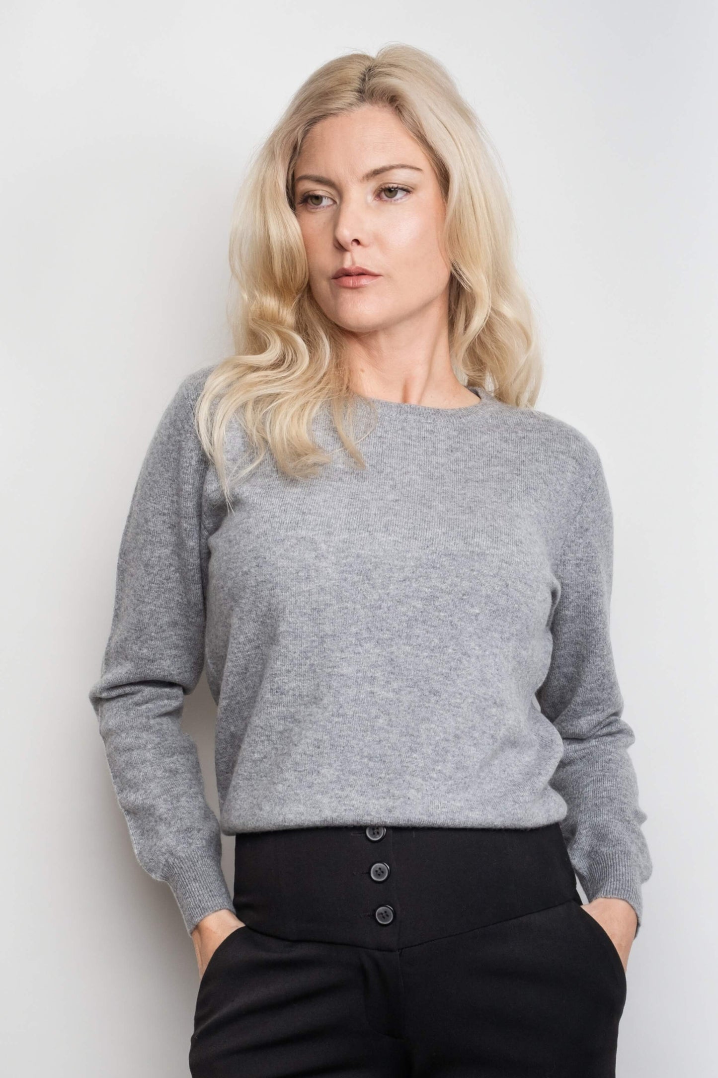 Model in grey cashmere crewneck sweater, hands in pockets – Love Cashmere NZ
