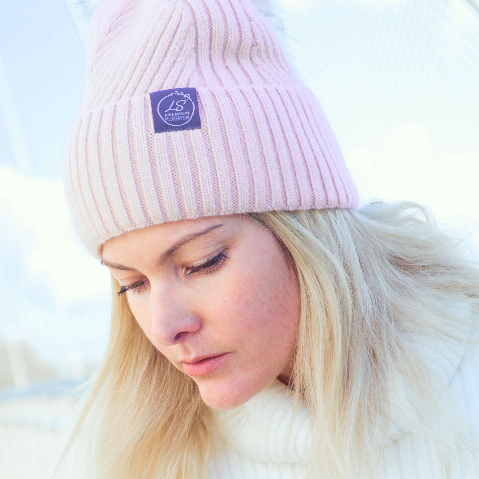 Woman wearing pale pink silk-lined beanie outdoors – LS Silk NZ