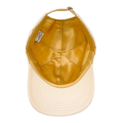 Beige baseball cap underside showing gold silk lining – LS Silk NZ