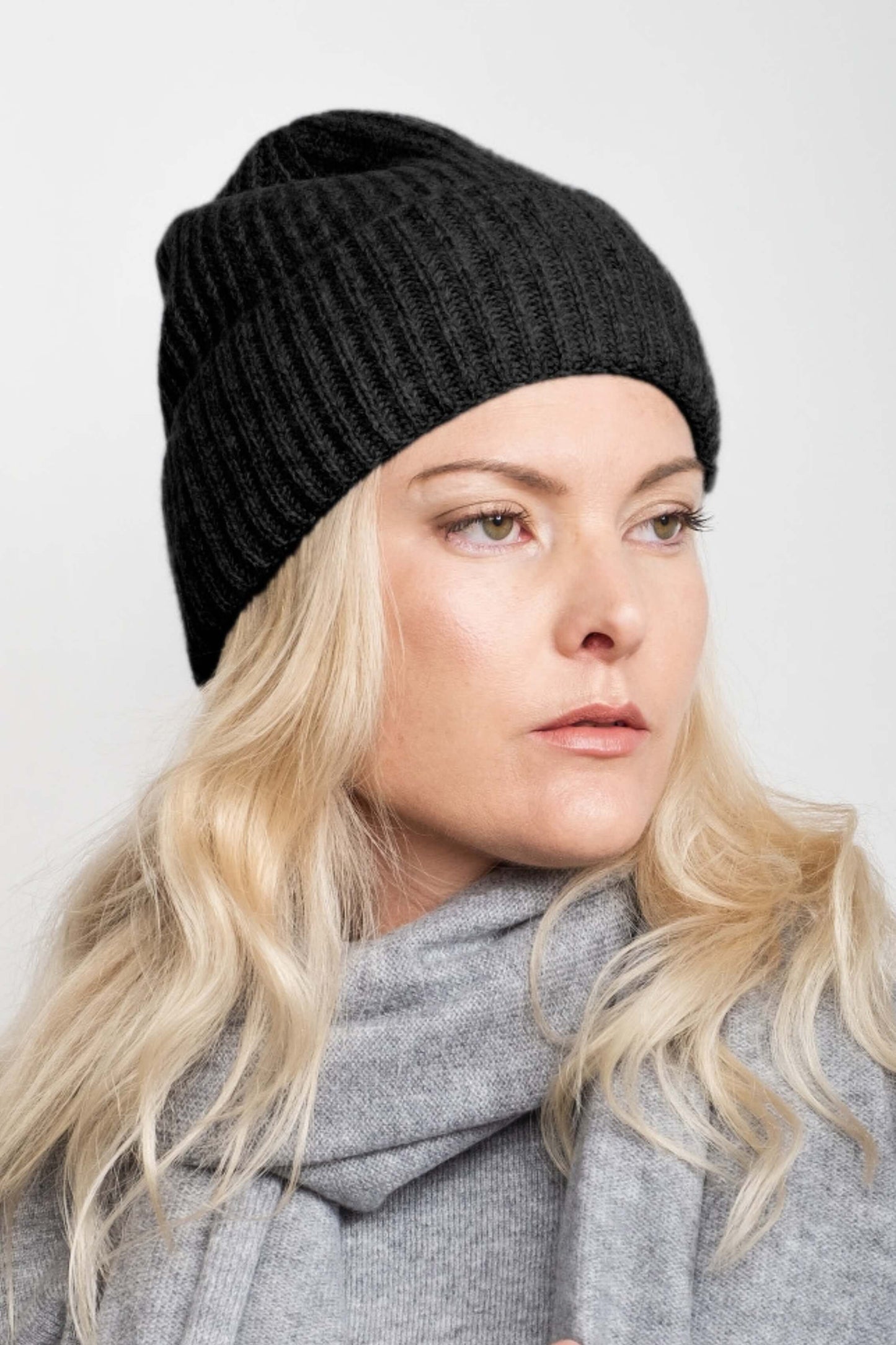 Model wearing black ribbed cashmere beanie with grey scarf – Love Cashmere NZ