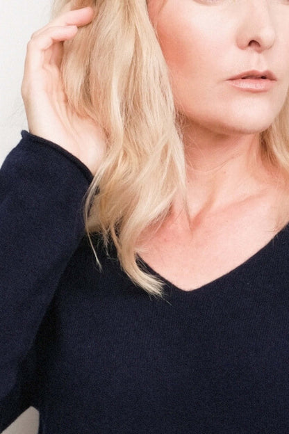 Close-up of navy V-neck cashmere sweater neckline detail – Love Cashmere NZ