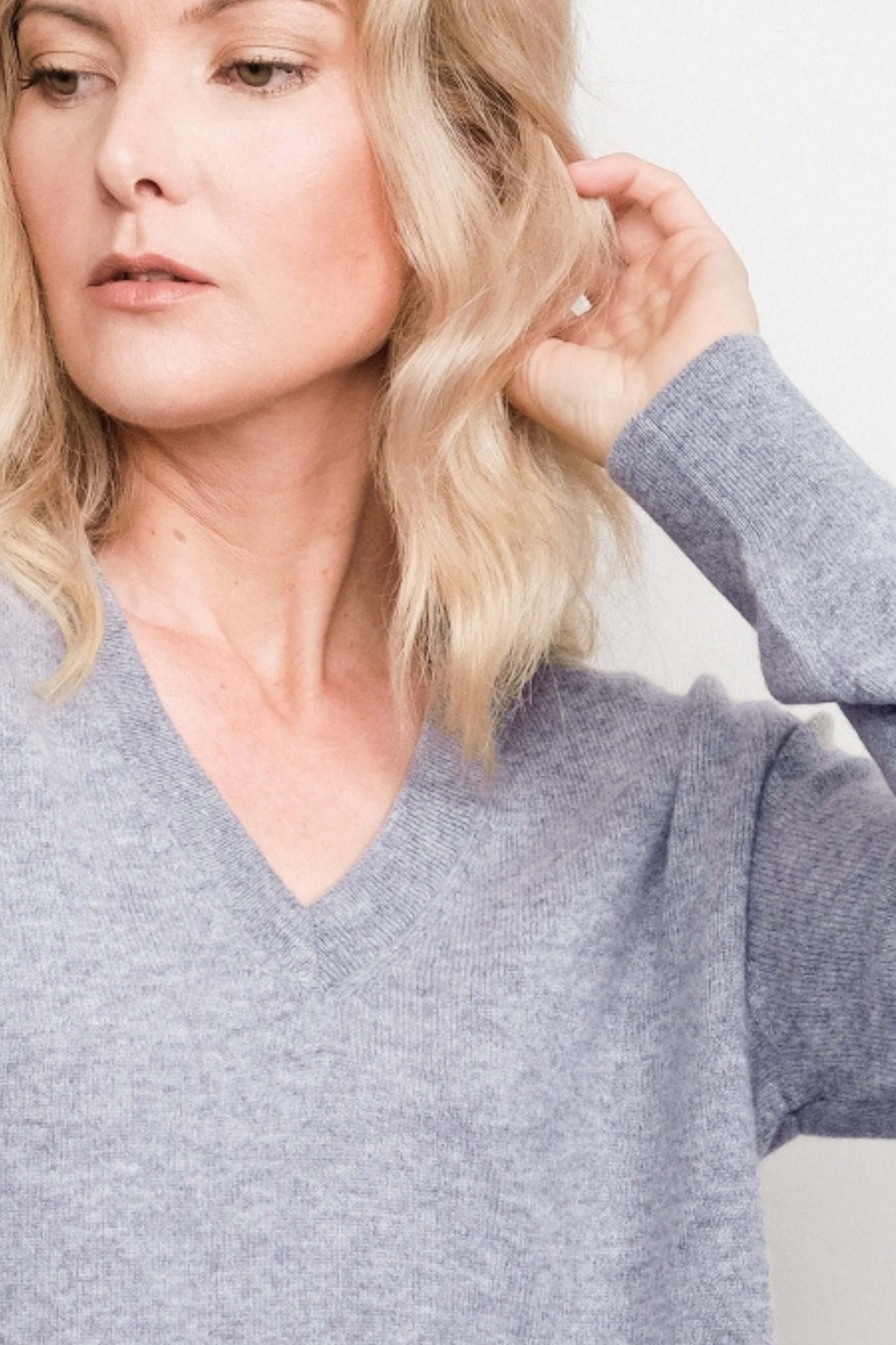 Close-up of grey cashmere V-neck sweater neckline – Love Cashmere NZ