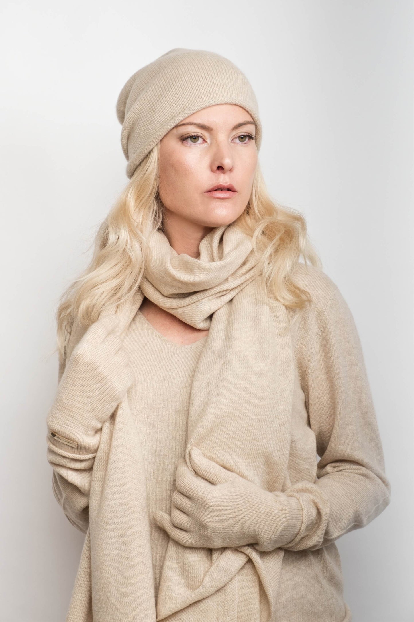 Model layered in cream cashmere beanie, scarf and cardigan – Love Cashmere NZ