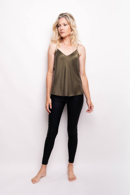 Model wearing pine green silk camisole with black leggings – LS Silk NZ