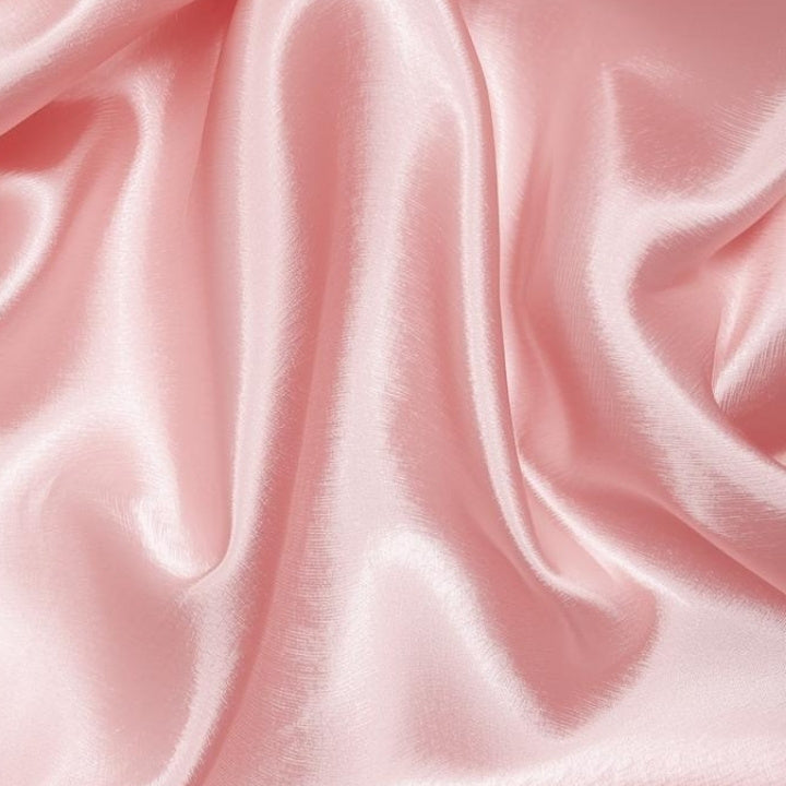 Close-up of pink silk fabric