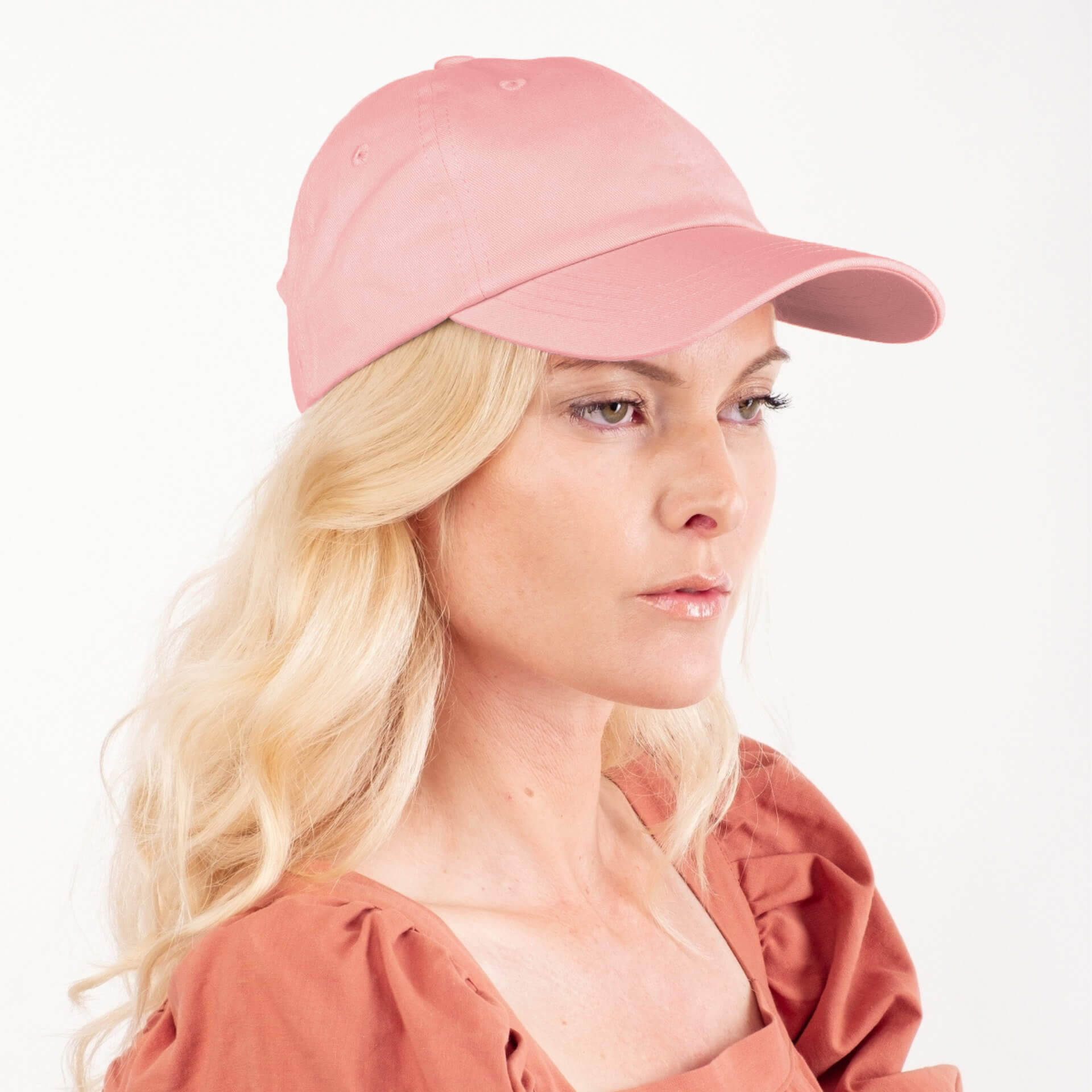 Woman wearing pink silk-lined baseball cap – LS Silk NZ