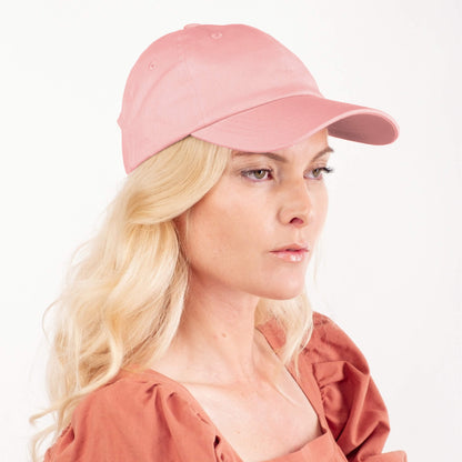 Woman wearing pink silk-lined baseball cap – LS Silk NZ