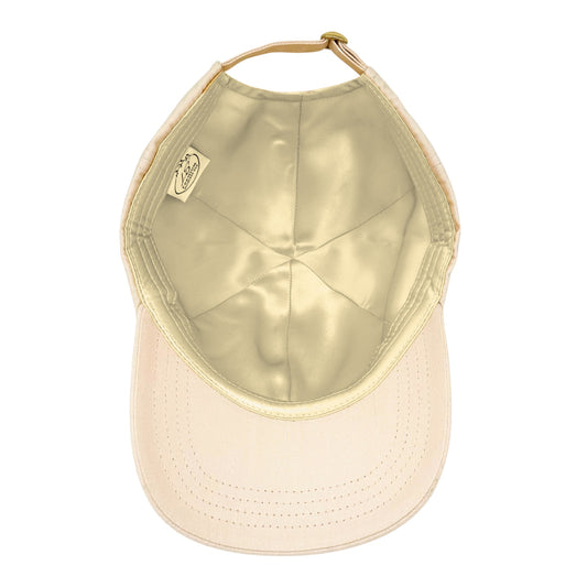 Beige baseball cap underside showing gold mulberry silk lining – LS Silk NZ