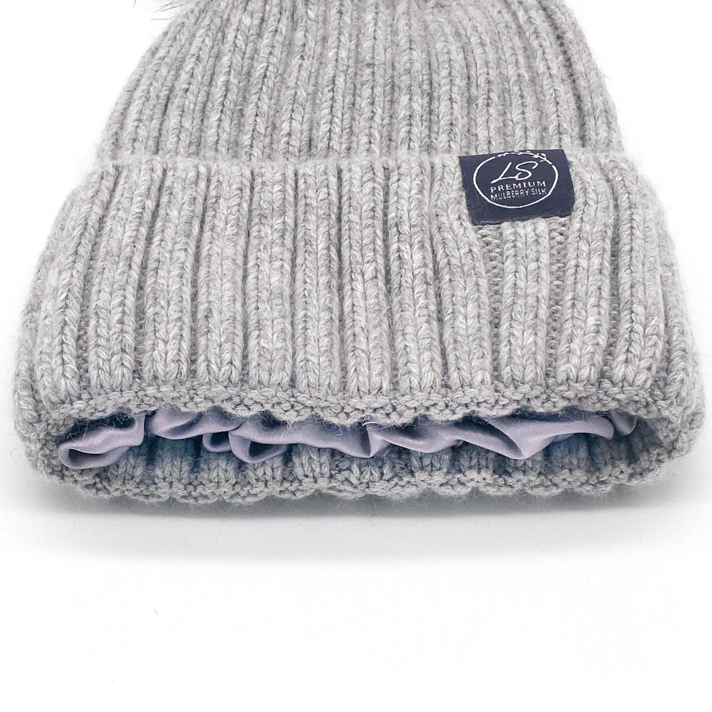 Close-up of grey beanie cuff showing lilac silk lining – LS Silk NZ