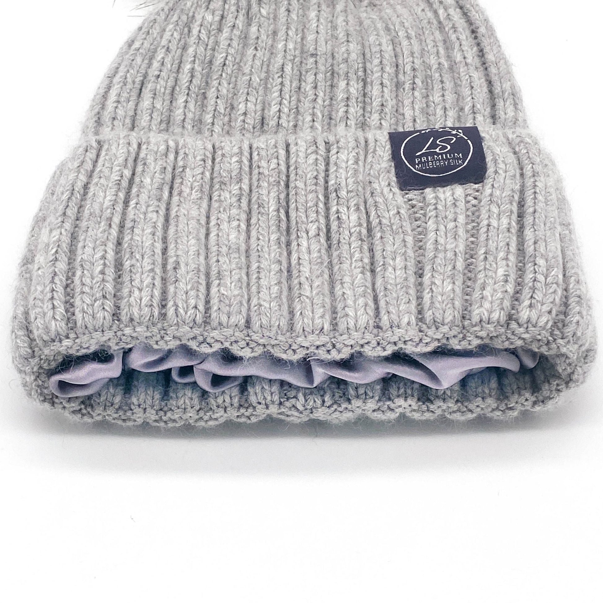 Close-up of grey beanie cuff showing lilac silk lining – LS Silk NZ