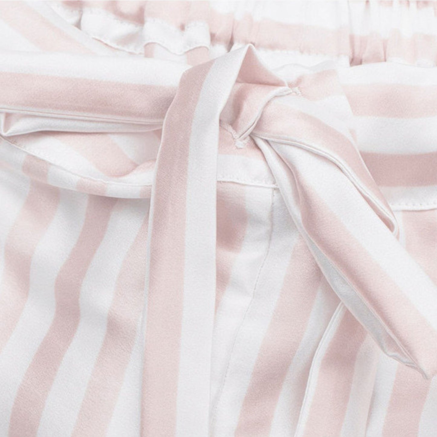 Close-up of pink striped silk pyjama shorts waist tie – LS Silk NZ