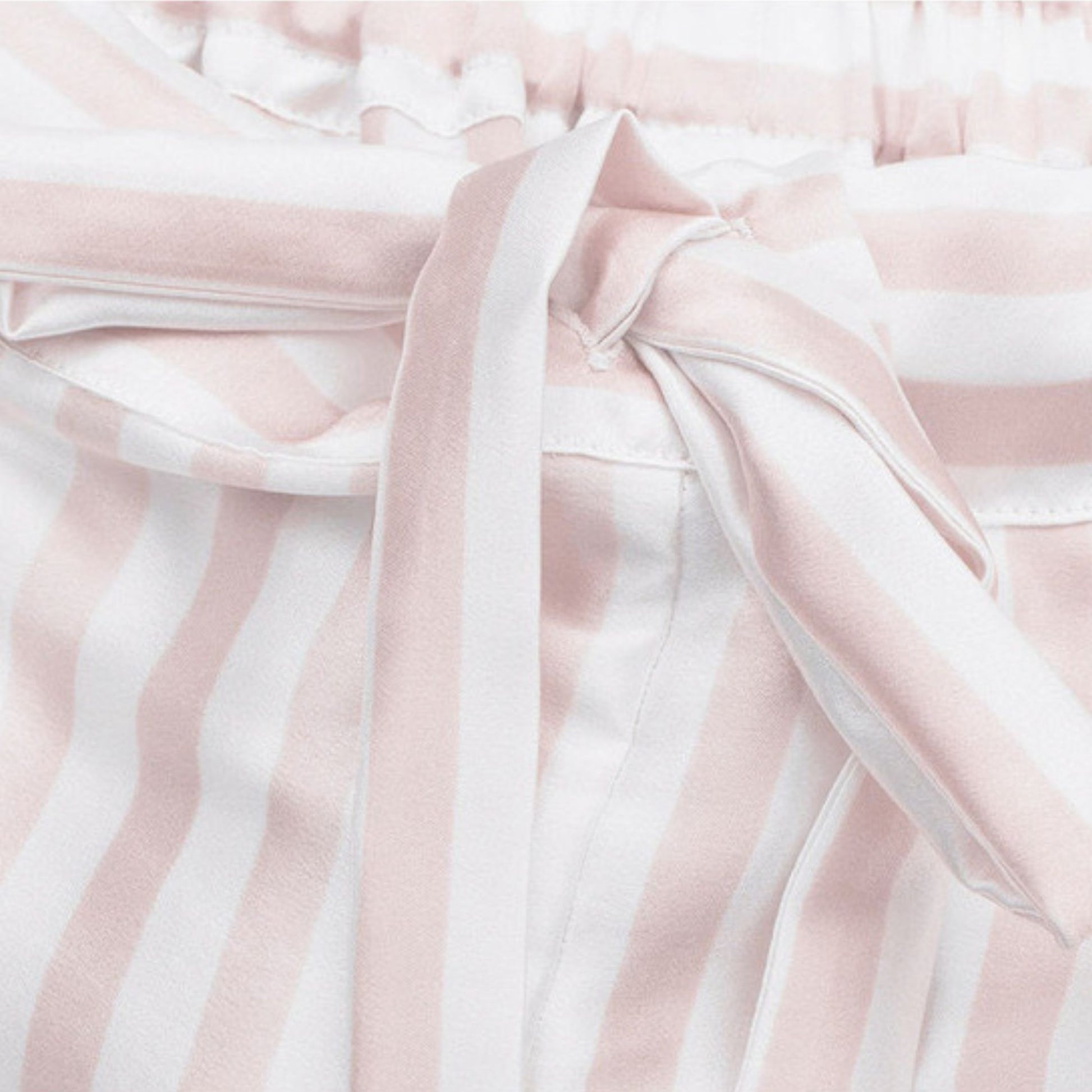 Close-up of pink striped silk pyjama shorts waist tie – LS Silk NZ