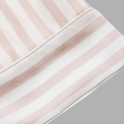 Close-up of pink and white striped silk fabric hem – LS Silk NZ