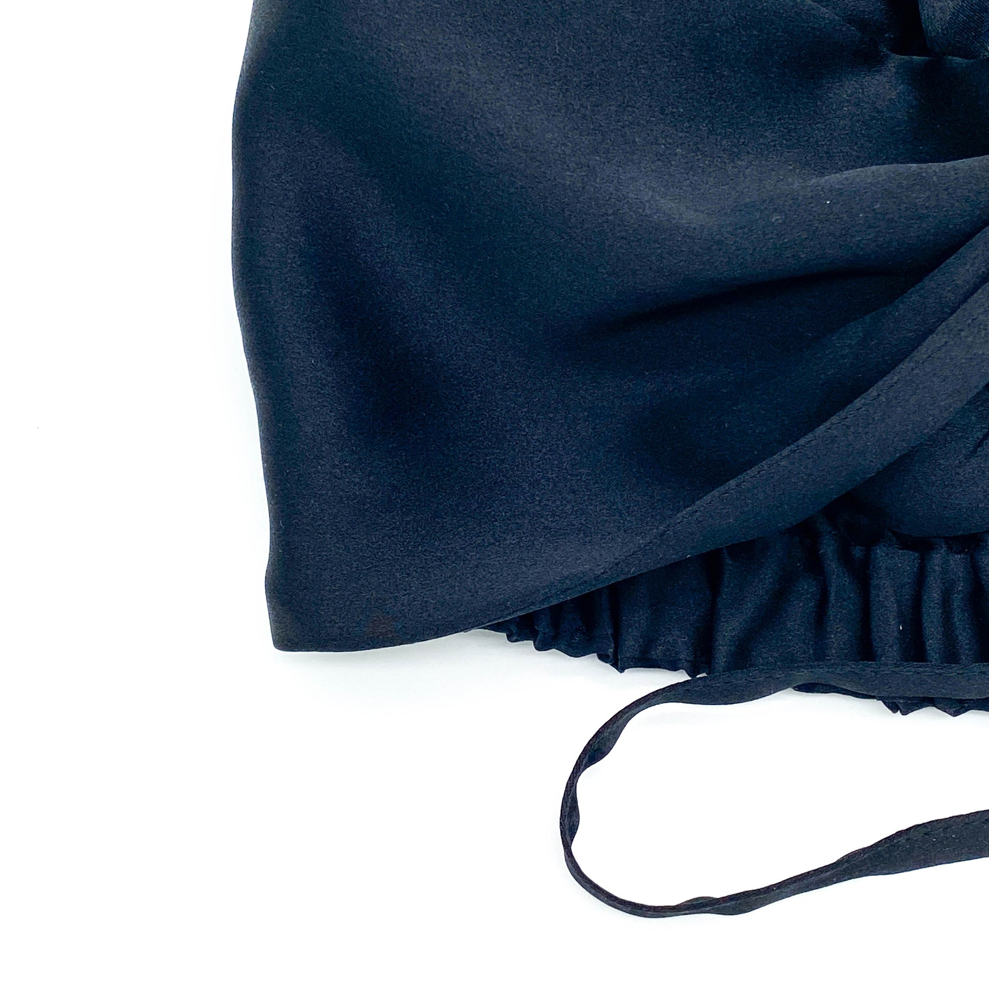 Close-up of navy silk bonnet edge with elastic and adjustable tie – LS Silk NZ